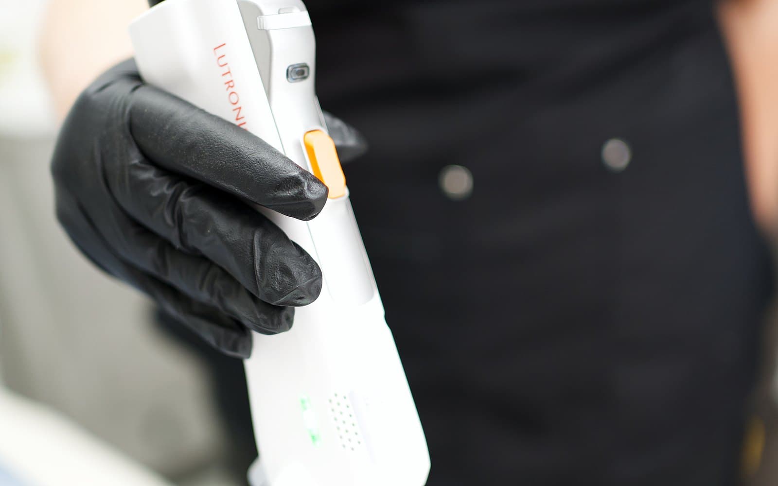 Clarity II laser handpiece being used during a hair removal session in Calgary